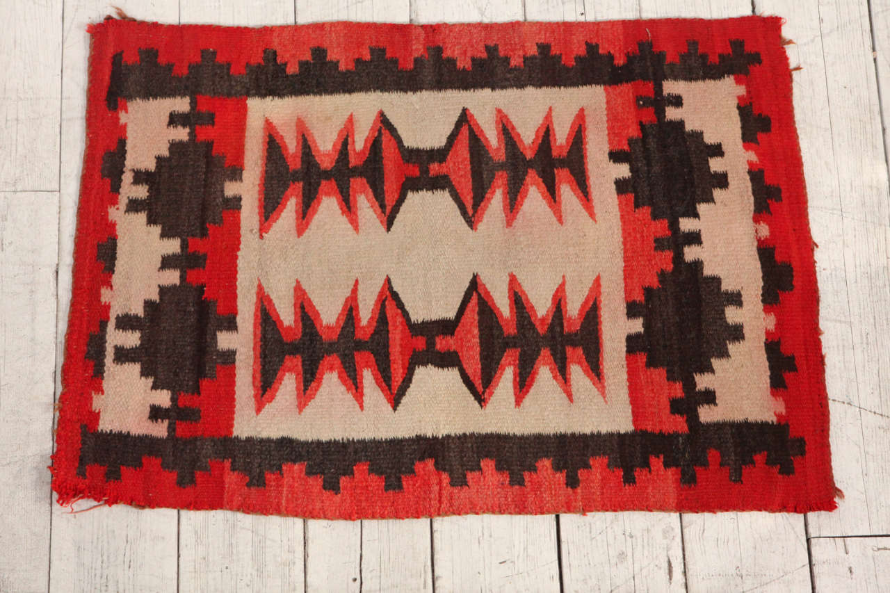 Throw rug / blanket in Navajo / American Indian style. Likely from Mexico.