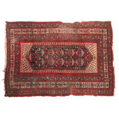 Woven Distressed Persian Rug in Red, Blue, and Cream