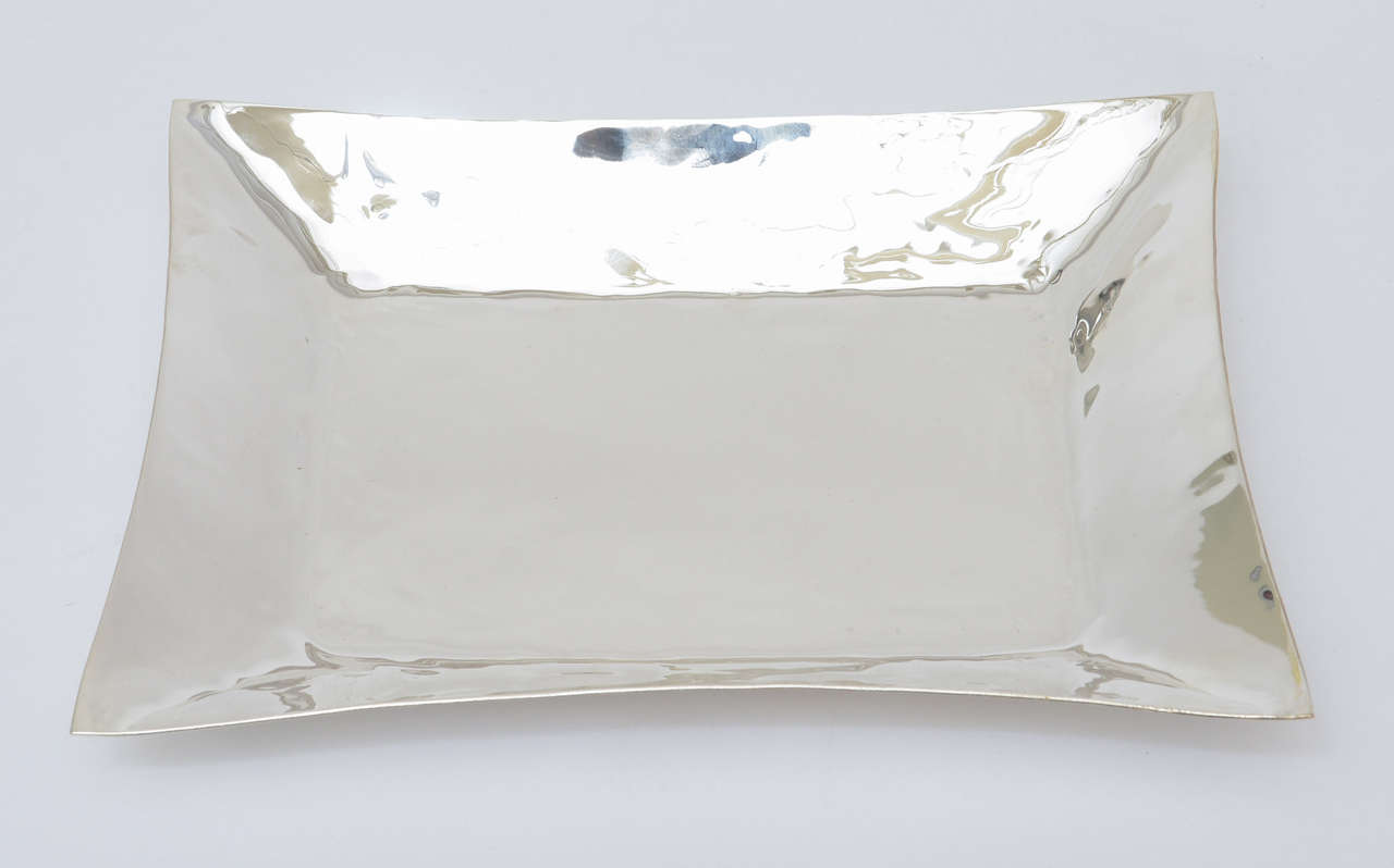 This modern yet period  Italian hand hammered square  polished silver-plate bowl/tray is perfect for any bar, table, dresser or console...
it is square with softened edges.