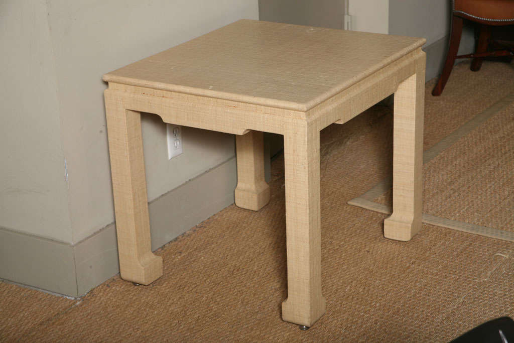 Lacquered raffia side table in the style of Karl Springer.