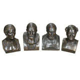 Set of FOUR bronzed plaster busts