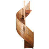 Antique A patinated pine spiral staircase