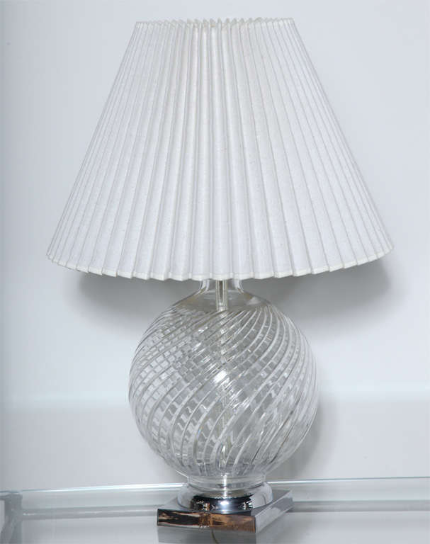 Pair of  Mid-Century Tyndale, American made, Crystal and Chrome Lamps. Featuring transparent Crystal Globes with incised swirl design, on a square Chrome base. Shades for display only. Versatile. Great Window Table Lamps,  Living Room Lamps, Bedroom