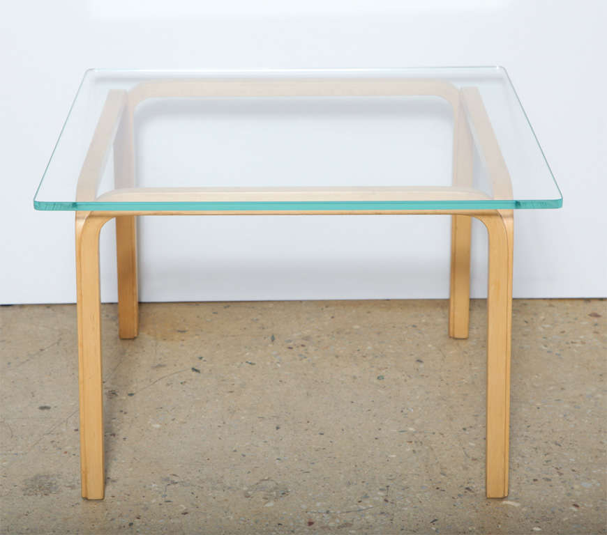 Beautiful and classic Alto table designed in the 1940's.  Perfect for use as Coffee or End Table. Glass size (27