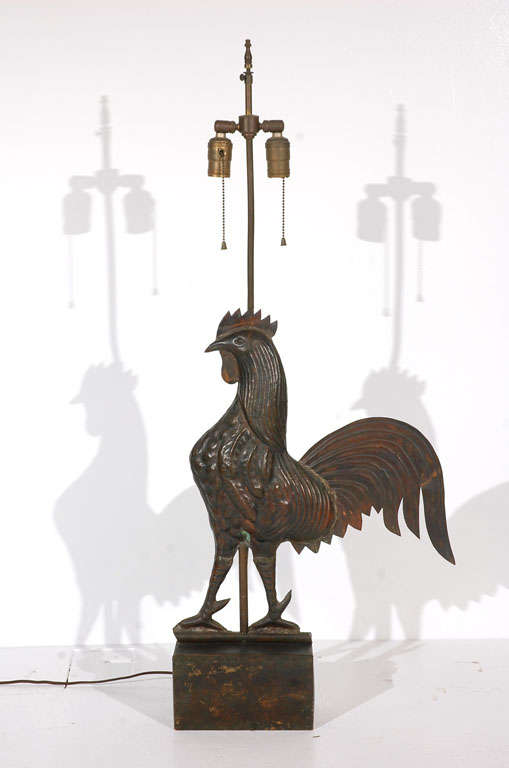 EARLY 19THC ORIGINAL OLD SURFACE ROOSTER WEATHER VANE WITH GREAT WORN PATINA .THE BASE WAS DONE IN THE EARLY 1900S .THIS LAMP IS MADE OF COPPER AND BRASS STEMS.OF COURSE THE ROOSTER IS WORN COPPER.THE LAMP ALSO WORKS AND IS ELECTRICFIED. GREAT