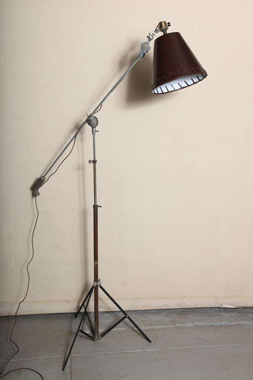 Adjustable photographer's lamp has a stitched leather shade (6 x 10 x 9), arm pivots, height can be adjusted from 36 inches to 79 inches, 100 watts.  REDUCED to 575. from $950.  Please contact dealer by clicking 