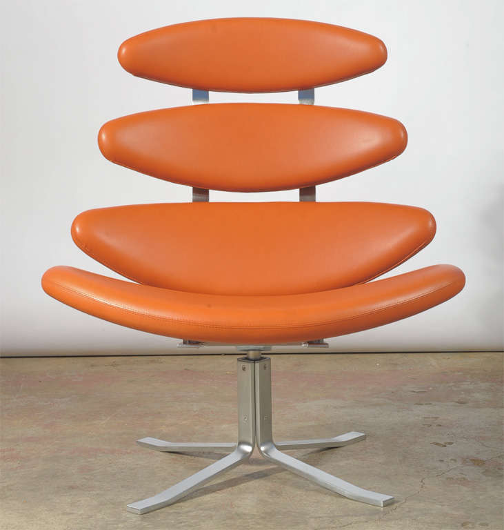 Four shells recently upholstered with Cognac-colored leather, brushed steel frame. Designed in 1961, produced by Erik Jørgensen Møbelfabrik A/S, model EJ 5.<br />
Literature: '1000 Chairs', Charlotte & Peter Fiell, Taschen, reproduced and discussed