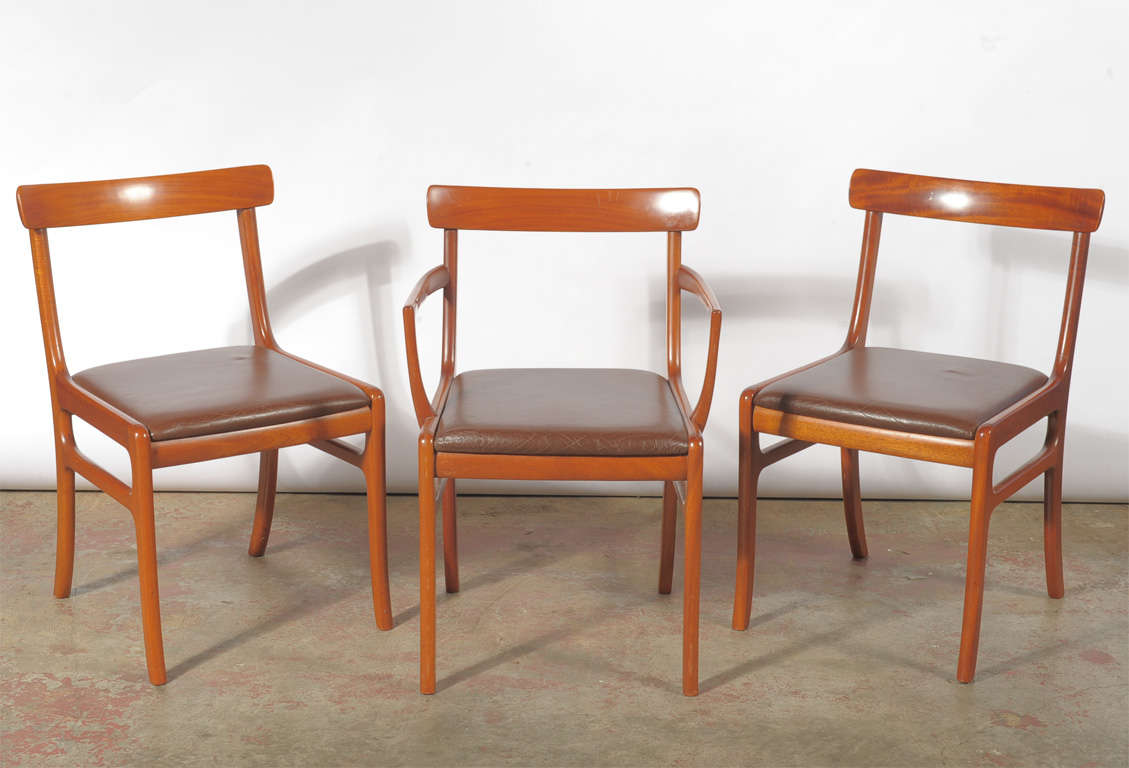 A set of mahogany dining chairs, 2 armchairs, and 4 side chairs. Produced by P. Jeppesen