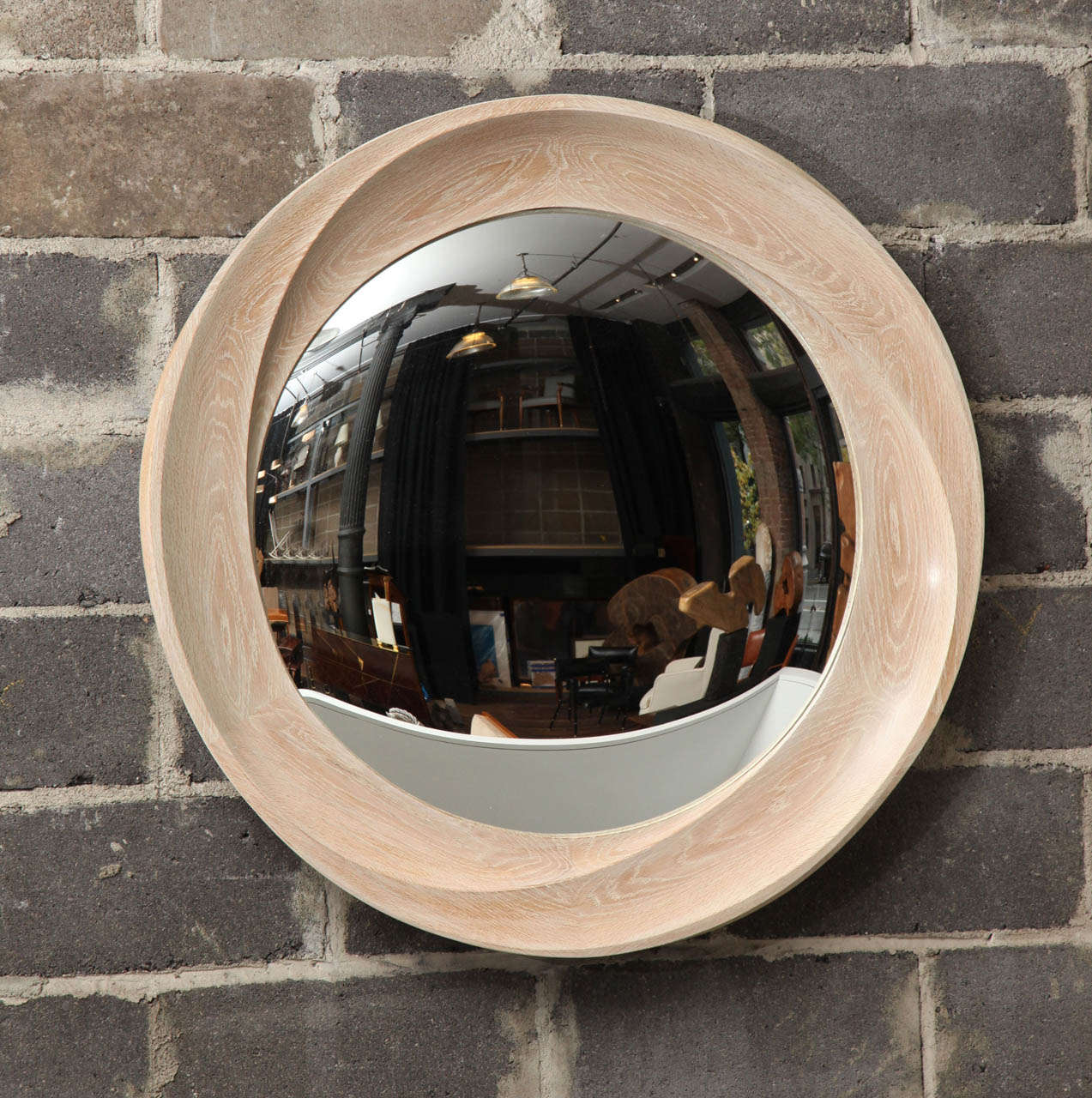 Convex mirror with limed oak frame by Carol Egan

*Please note this item is by order