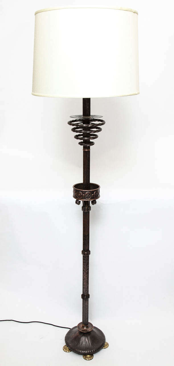 A 1920s Art Deco patinated bronze floor lamp.
Shade not included