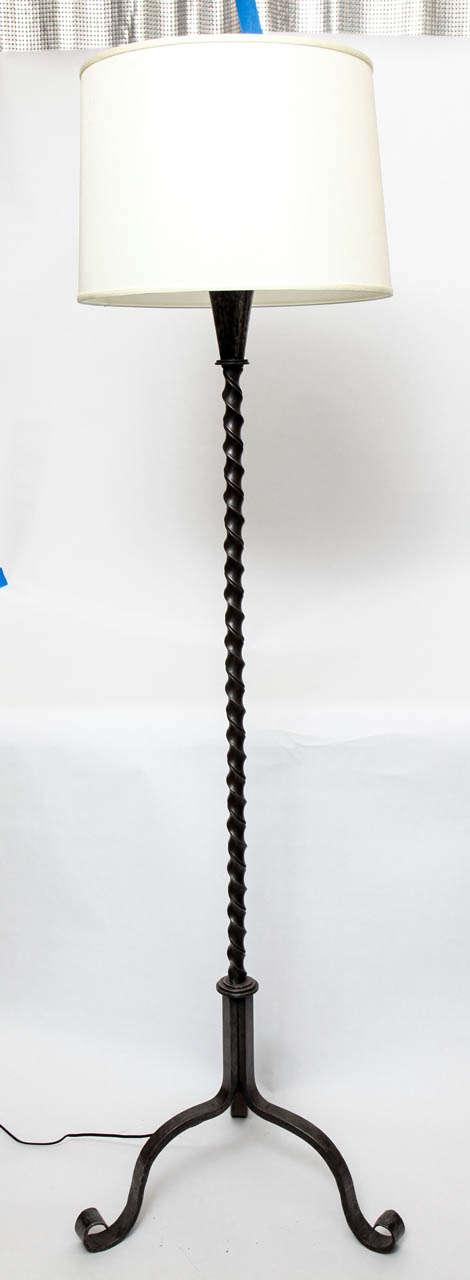 A 1940s French art moderne wrought iron floor lamp.
Shade not included