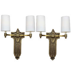 A Pair of 1920's French Art Deco patinated brass Sconses