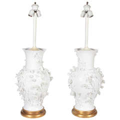 Pair of Antique Blanc de Chine Porcelain Lamps with Raised Flowers