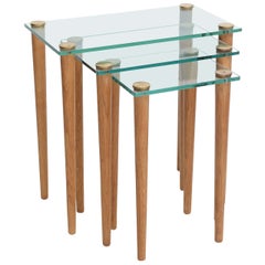 American Modern Set of Walnut, Brass and Glass Nesting Tables, Gilbert Rohde