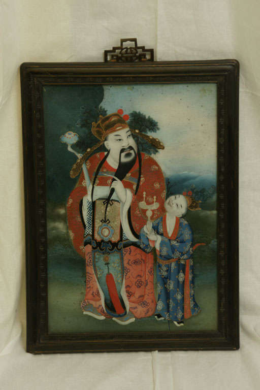 Late 19th century Q'ing Dynasty framed double sided reverse painting on glass in original carved frame.