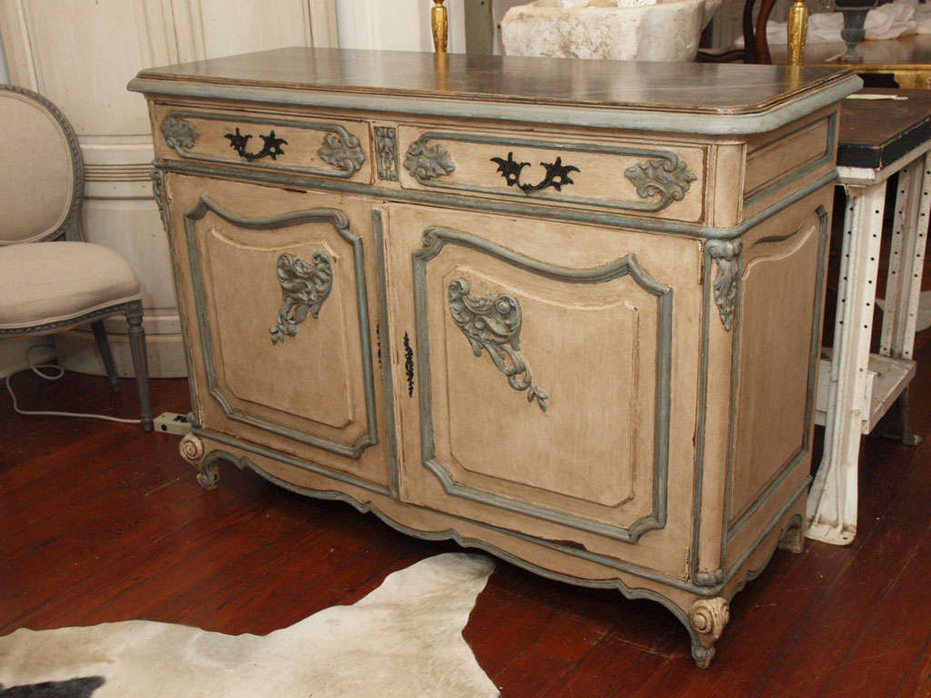 Absolutely stunning French Antique server or sideboard painted in a swedish grey with french blue details and beautiful painted faux marble top.  Original bronze hardware.  Hand carvings throughout.  Two top drawers, cabinet bottom with inner shelf.