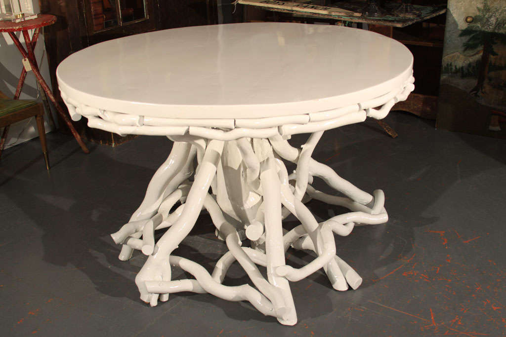 Chic Twig-Style Center Table in a high-gloss creamy white lacquer finish.  A subtle way to bring an outdoor or organic form into any modern setting, this is perfect with a holiday display, a serving table for parties, an office or foyer piece, etc.