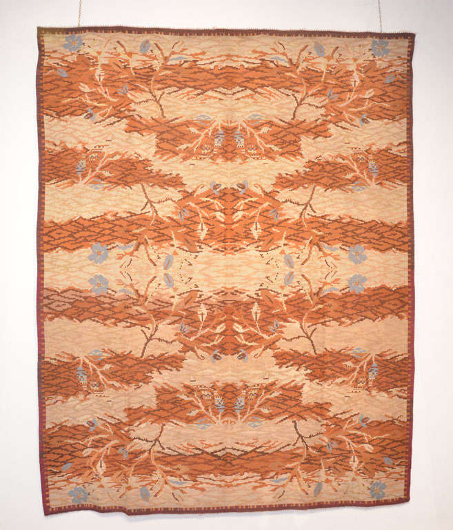 An unusual Bessarabian kilim characterised by an abstract floral spray superimposed on a tiger pelt-like background, in an eclectic style which is quite typical of Mid-Century Modern weavings.