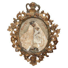 A Period Rococo Frame with Terracotta Madonna and Child