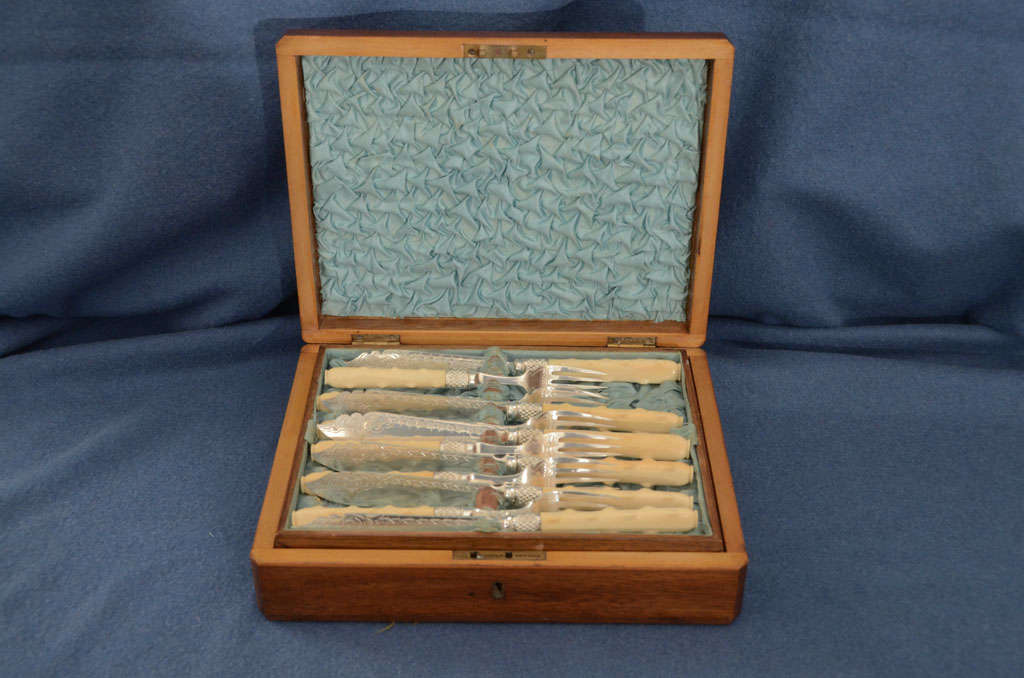 ENGLISH FISH KNIVES & FORKS SILVER PLATED WITH ENGRAVING--FAUX BOIS CARVED IVORY HANDLES--RAISED DIAMOND BESEL AT END OF HANDLE--IN ROBINS EGG BLUE SILK LINED MAHOGANY BOX WITH BRASS CARTOUCHE
