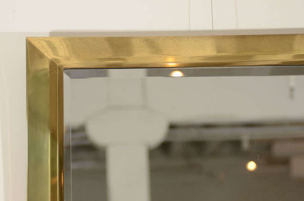 American A Rectangular Brass Mirror Frame with Bevel Edged Mirror. 