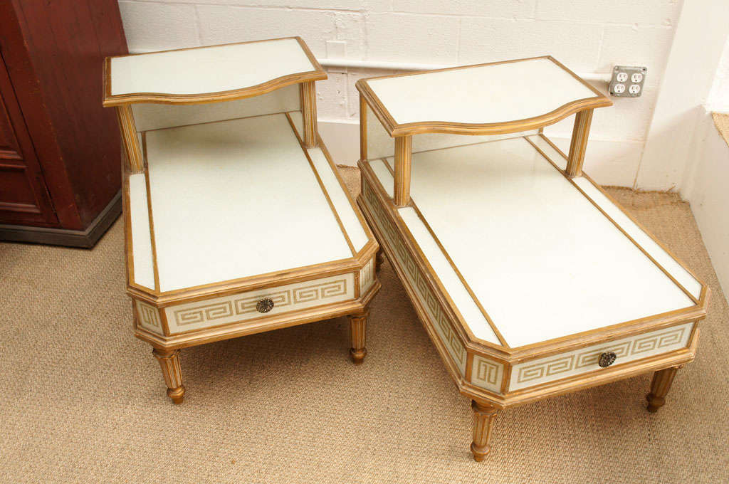 A Pair of Eglomise Step Tables