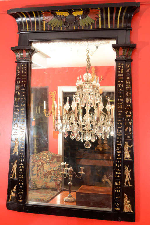 An unusual Regency egyptian revival polychrome mirror.