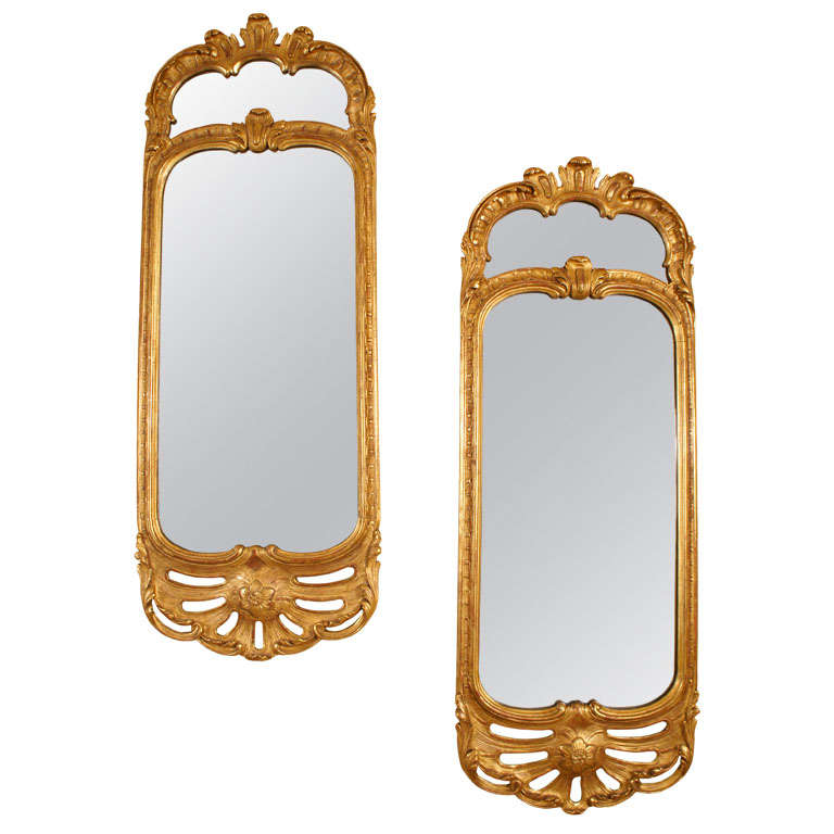 A Pair of Fine Swiss Rococo Giltwood Mirrors