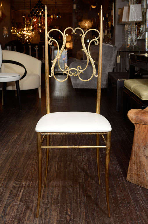 Mid-20th Century Pair of 1940's Brass Chairs with Cream Faux Shagreen Seats