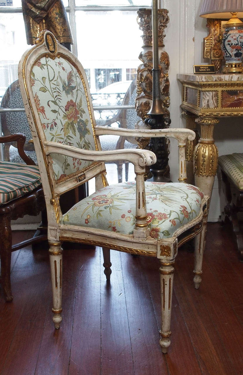 Pair of Period Louis XVI painted and parcel gilt Italian armchairs with Lyon Silk 
18th century.