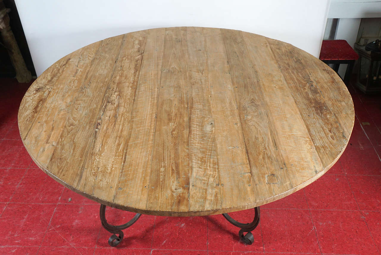 Rustic Outdoor or Indoor Round Teak Wood and Metal Base Dining Table at