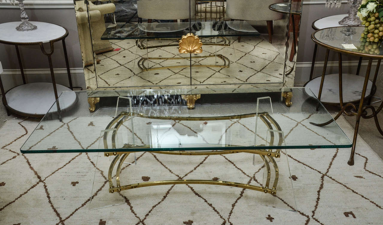 Attractive vintage brass, Lucite and glass cocktail table by Charles Hollis Jones.