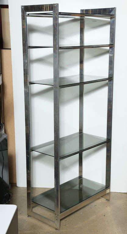 Circa 1970 Aluminum and Smoked Glass Vitrine, Room Divider, Shelves in the manner of Paul Mayen. Sturdy, rectangular Aluminum framework, with Five lightly Smoked Glass shelves and four disc floor levelers. Supreme quality. American Modern.