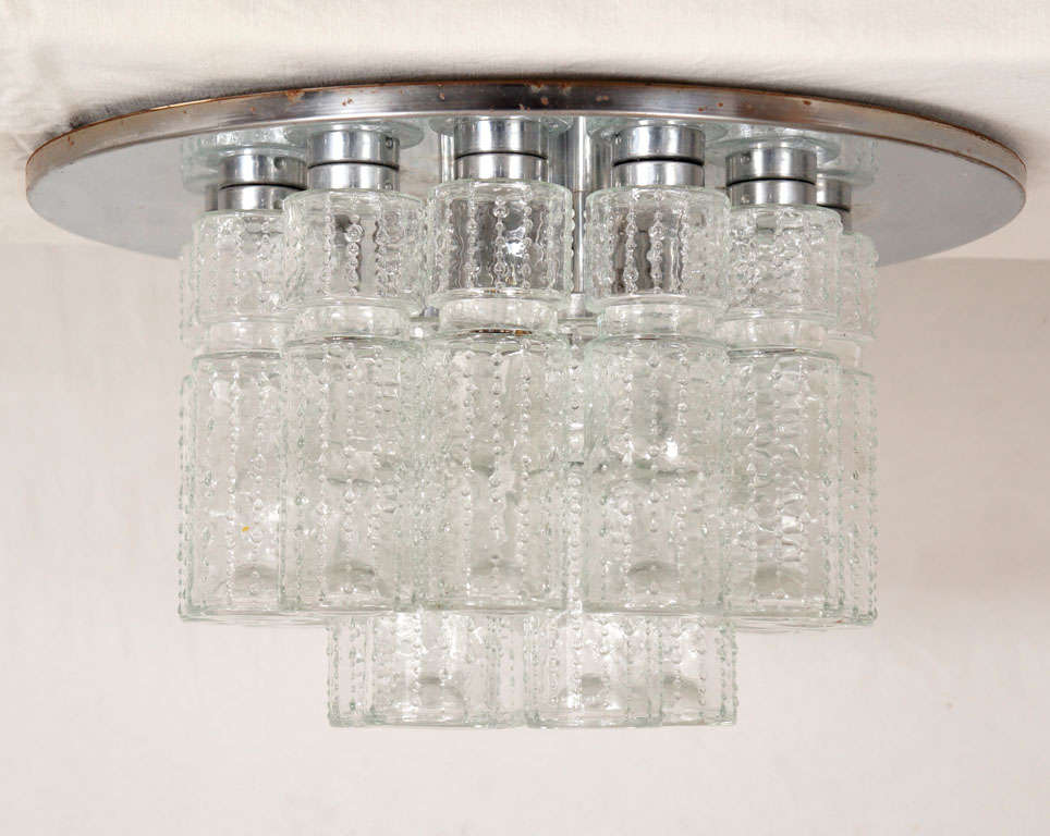 these lights are fantastic!
They hung in a private woman's powder lounge in the Henry Ford building in Michigan.
They were a custom design by lightolier.
All glass is perfect, with a few extra cylinders for those OS moments.
glass tubes surround
