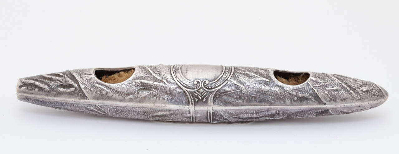 Sterling silver humidifier for cigar humidor in the form of a cigar. Detailed tobacco leaf effect on the silver makes for a very realistic piece. Measures 4.5