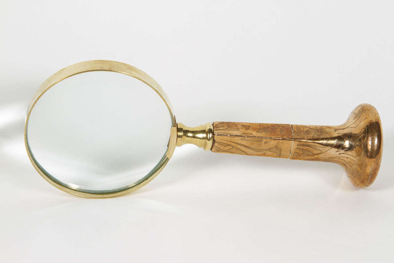 Small magnifying glass made with antique parasol handle c.1850-1900 gold plate
7.25