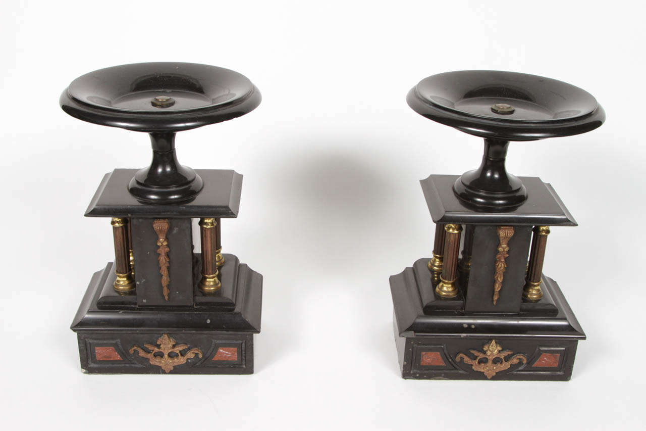 Pair of antique marble and metal pedestal stands.