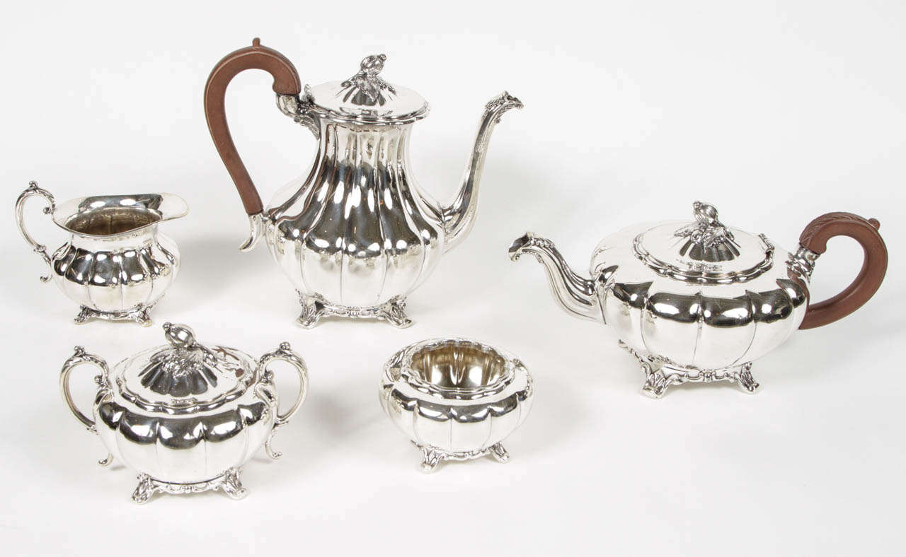 Vintage five piece silver plate English coffee and tea service in old English melon pattern. 

Coffee pot: 11