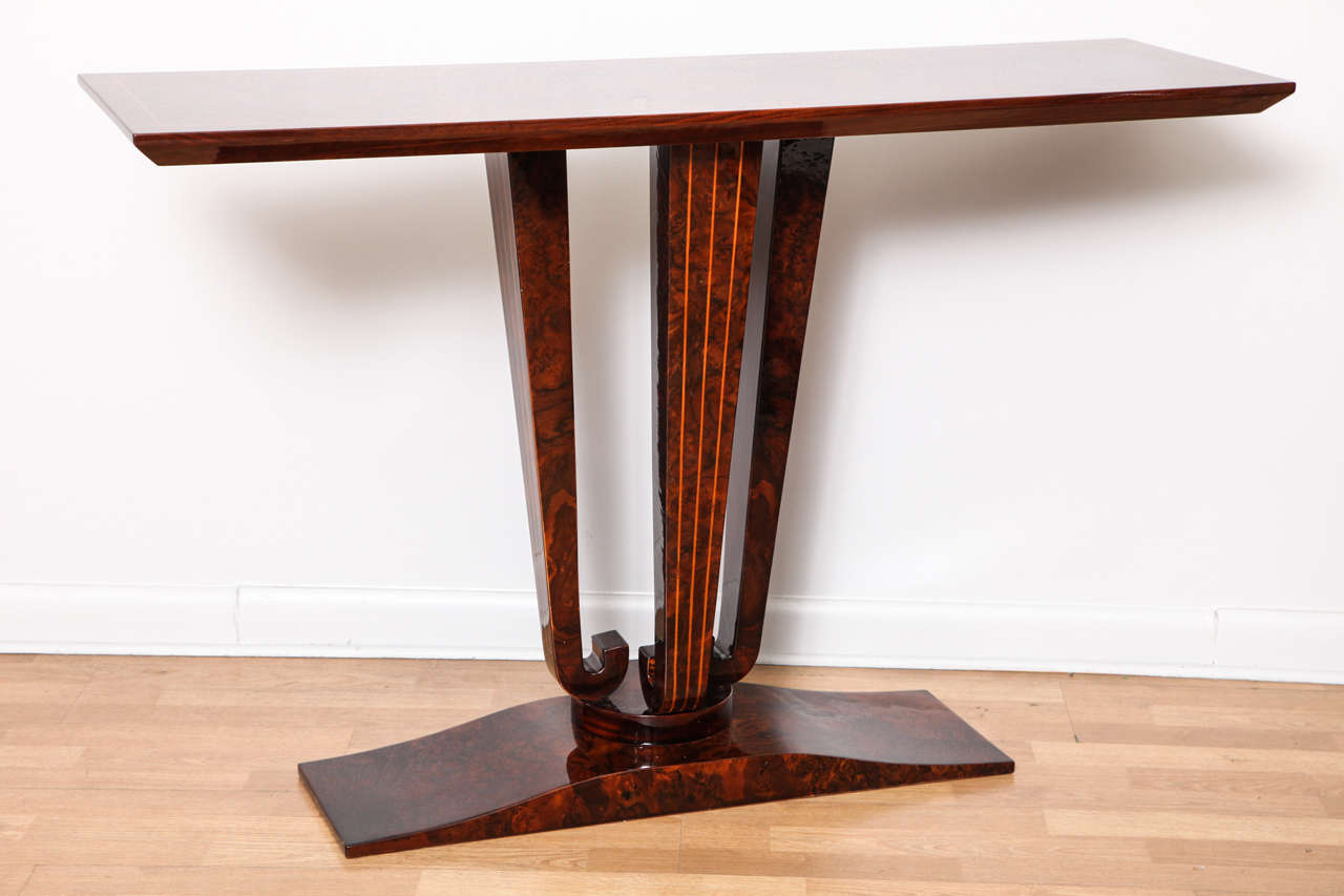 An Art Deco console table with inlay design.