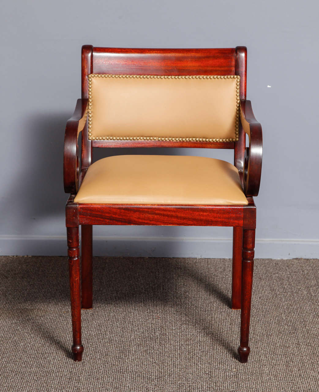 Tinted pine chairs from the early Art Deco period , beige coloured leather upholstery.