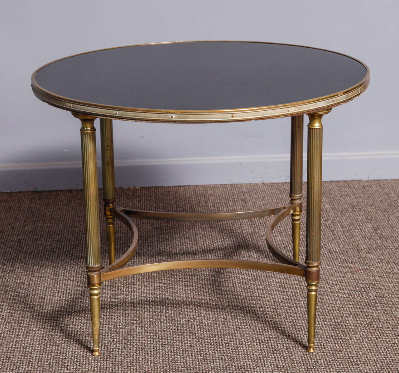 Brass and black glass French origin coffee table.