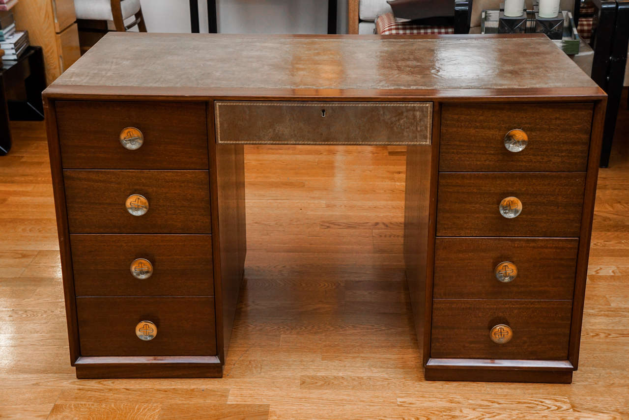 this elegant, double pedestal desk, with tooled leather and fabulous hardware, can 