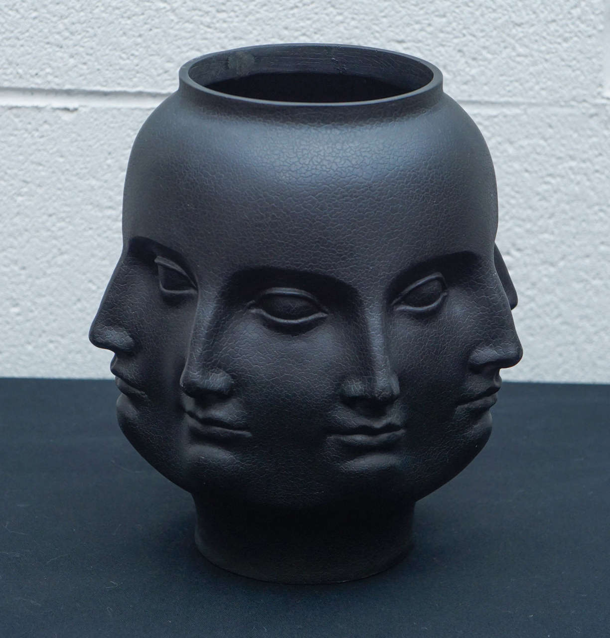Here is a beautiful Dora Maar vase made of resin in a black crackled finish.
The vase was produced by TMS in 2005.