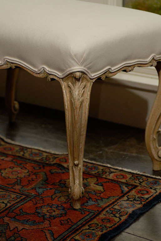 Carved French Louis XV Style Backless Upholstered Bench with Cabriole Legs, circa 1900