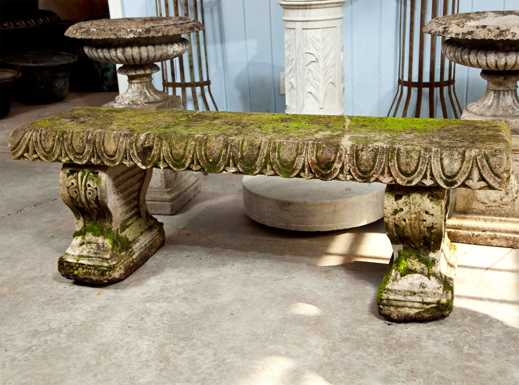 A rare and fine carved limestone bench in 3 parts. Found at an estate in the Var region of France, this beauty has a deeply carved egg and dart apron and volute-carved supports. The overall effect is simply breathtaking. The weathered pale