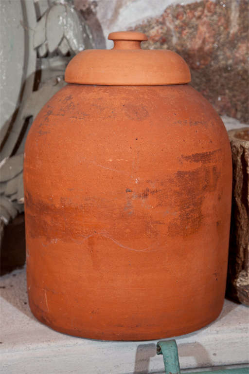 This beautiful terracotta forcing pot dates to the early 20th century, although the lid is likely a late 20th century replacement. Beautiful surface and condition, we would prefer to sell this as part of our collection of six forcers, all different.