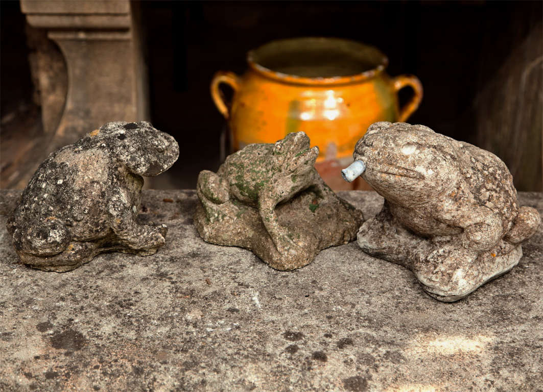 These charming and unique froggies make an amusing and whimsical grouping, inside or out.  The left-hand one is quite detailed and weathered and measures 8.5