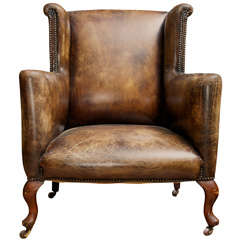 Low Wing Chair with Distressed Leather