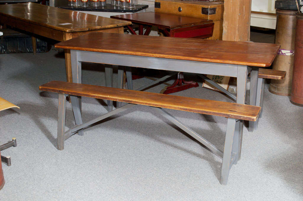 Stained pine wood top on grey painted base French farm table of small size with a  pair of matching benches