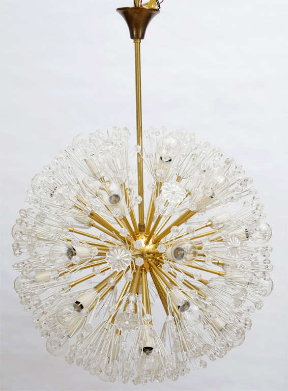 This iconic 1950's era Sputnik-like chandelier made by the world renown Austrian Designer;   for Rupert Nikoll, a Vienna Based Austrian Manufacturer, and known too many as the 